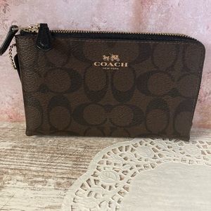 Like new coach zip around wallet. Used one time.  two interior sections